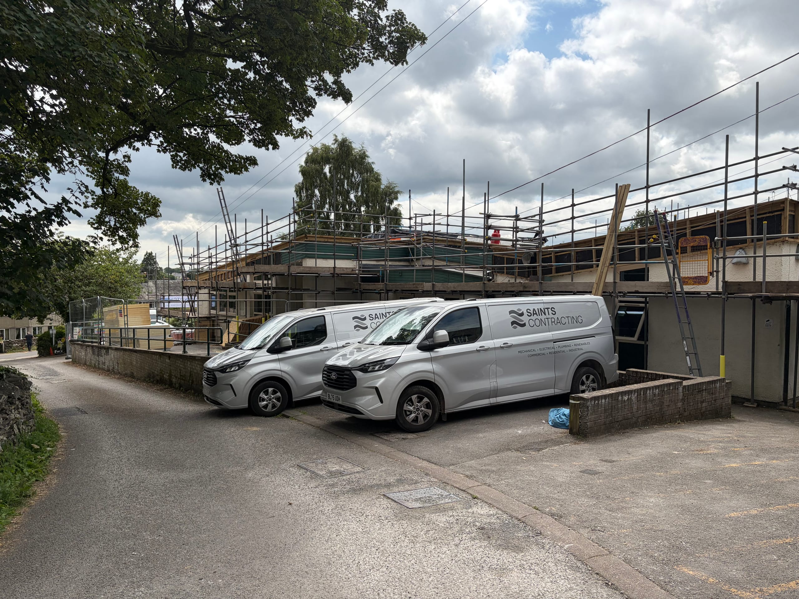 Saints Contracting vans outside Staveley C of E School during refurbishment